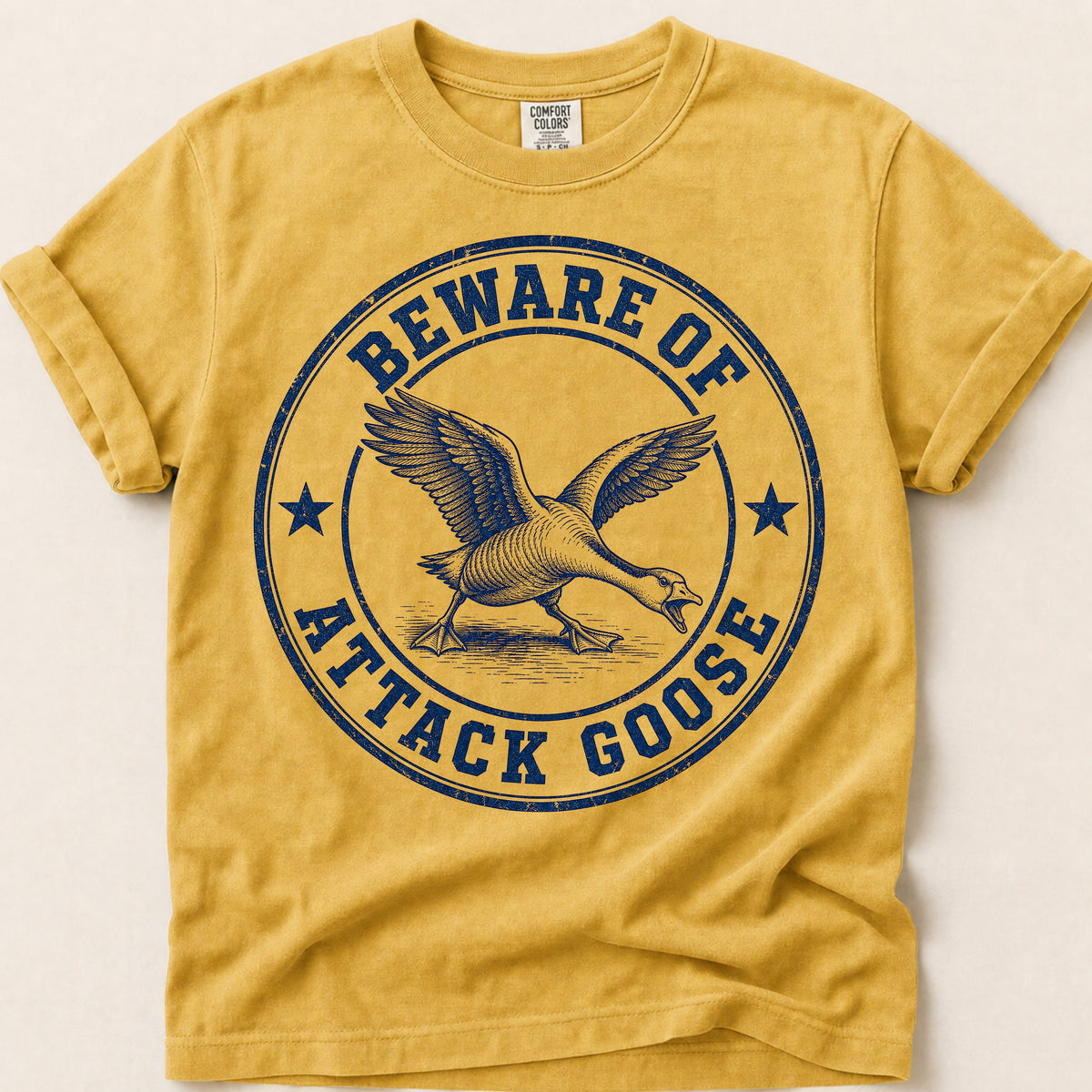 Beware Of Attack Goose T-Shirt on Mustard