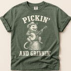 Pickin And Grinnin Possum T-Shirt on Moss