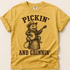 Pickin And Grinnin Possum T-Shirt on Mustard