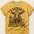 Rather Be Checking Cows T-Shirt on Mustard